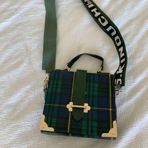 Green plaid cross body purse.